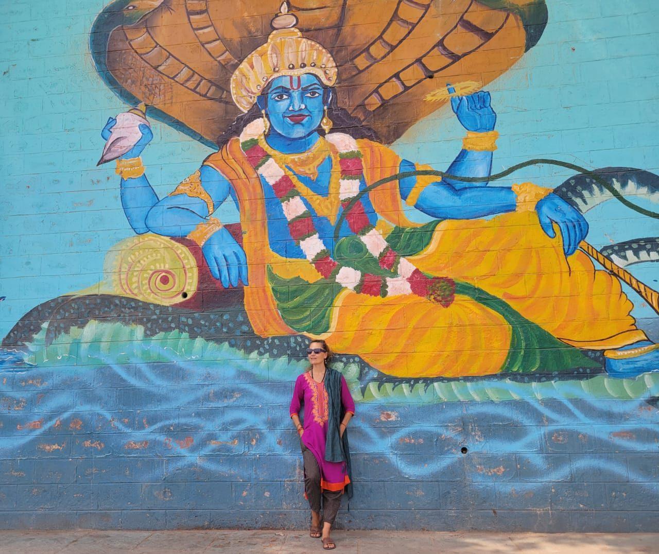 Standing in front of the Vishnu mural, India